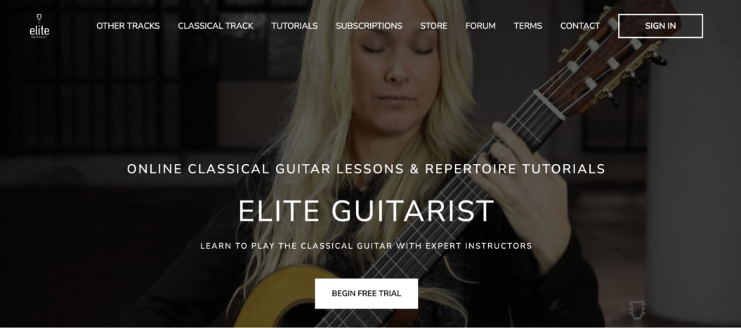 An image shows the website of online coaching membership site for guitar lessons called Elite Guitarist.