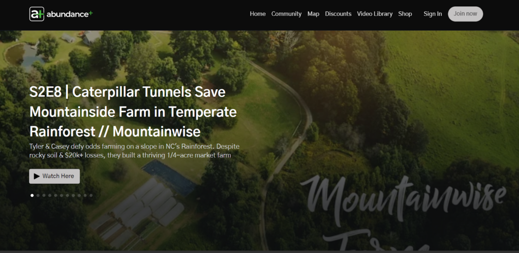 Abundance+ homepage featuring episode on farm innovation in NC's Rainforest, showcasing lush green fields and forest landscape.