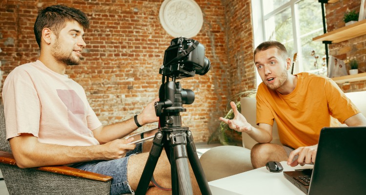 An image showing two men talking about ways of making money with live streaming.