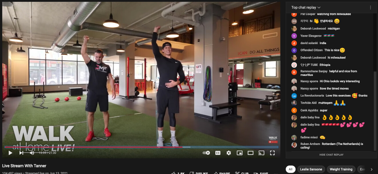 Fitness instructors hosting a live workout on YouTube, indicating they learned how to make money as a fitness instructor on YouTube. 