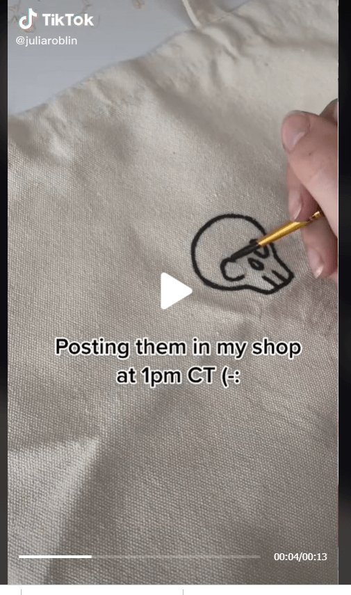 A TikTok video about hand-drawn merch and stickers.