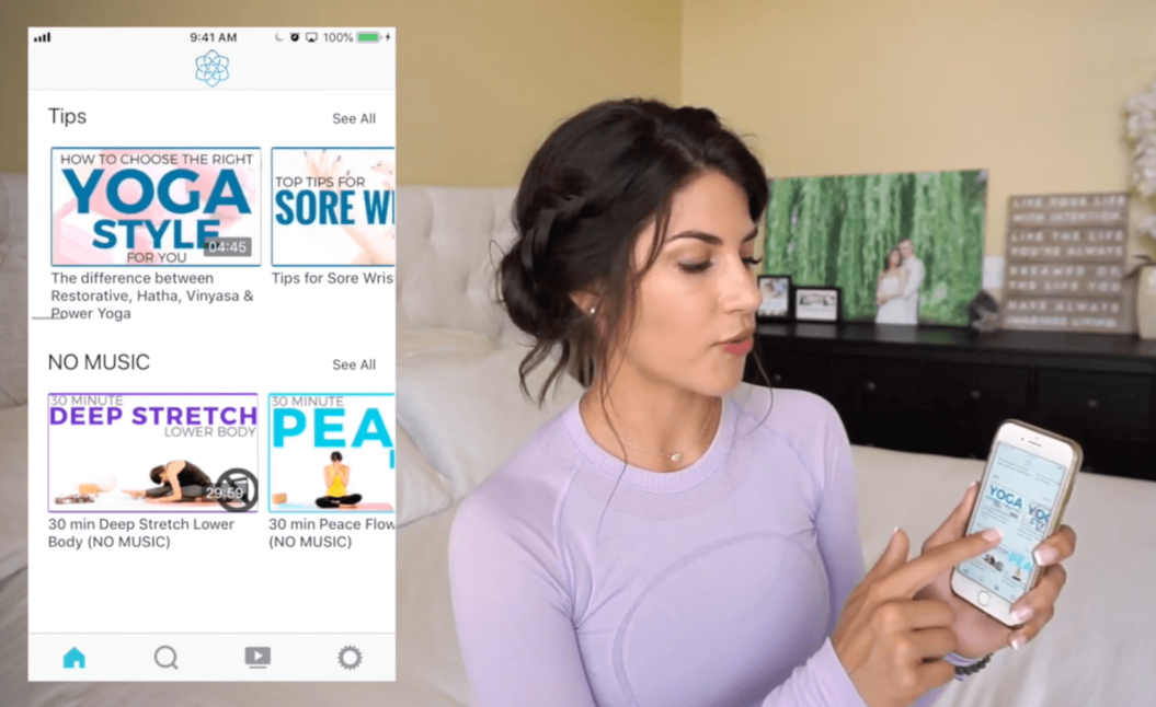 An image shows Uscreen customer, Sarah Beth Yoga, showcasing her OTT app for iOS created by Uscreen.