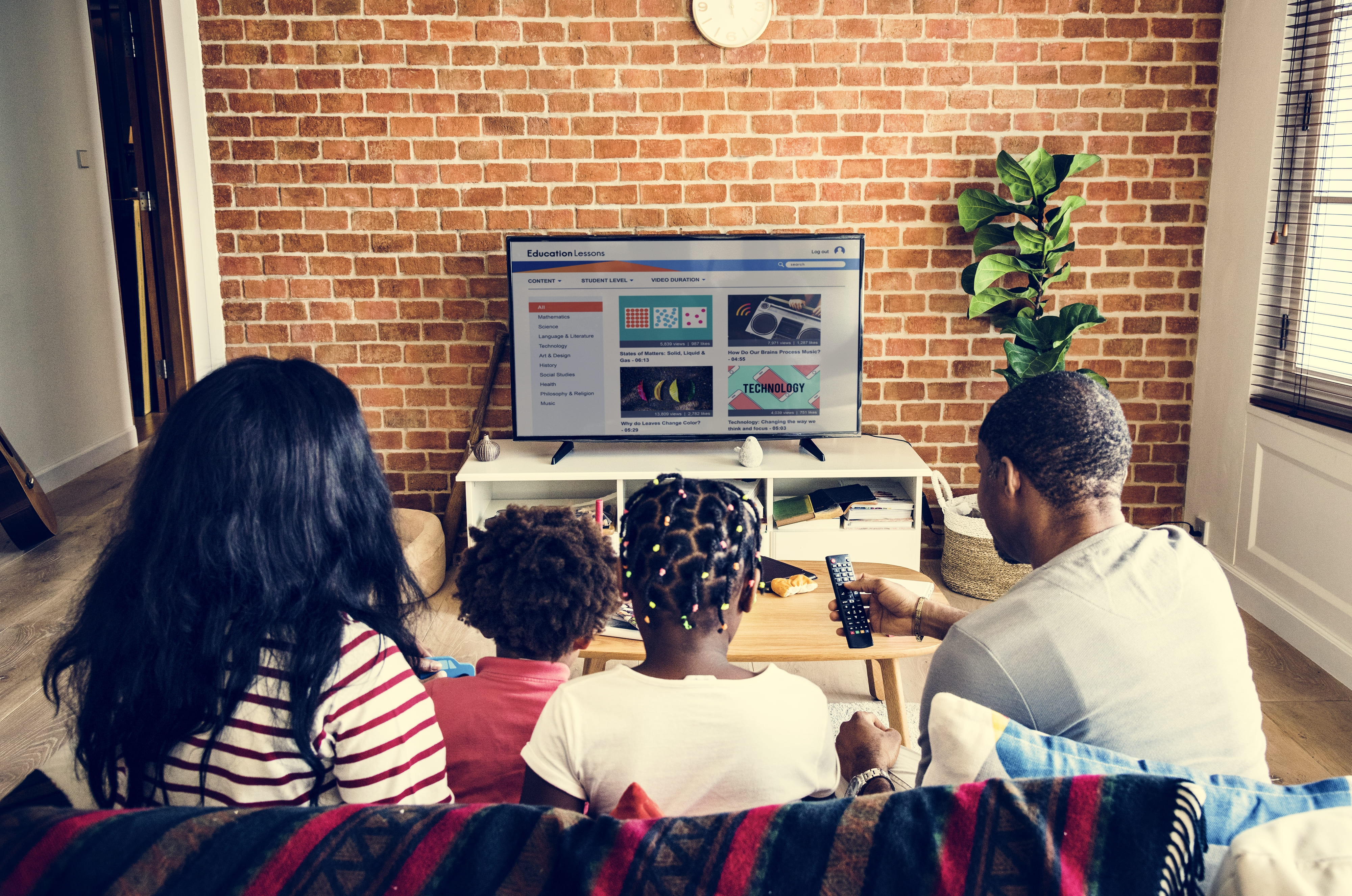 family watching educational content on an ott streaming platform