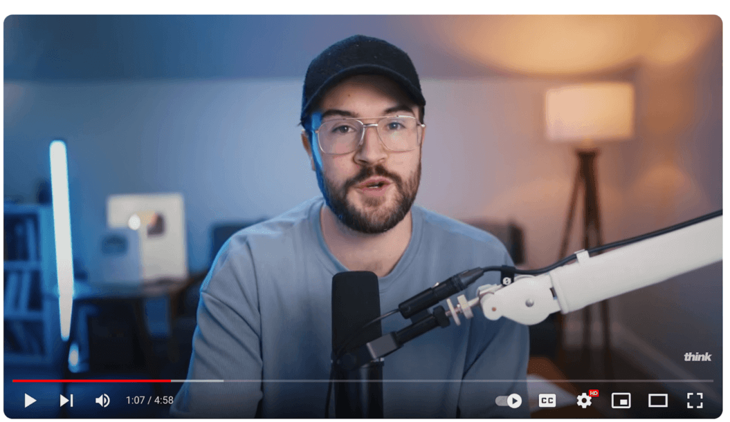 Screenshot of a youtuber using a microphone arm