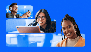 A group of individuals interacting with video content, some filming and others watching.